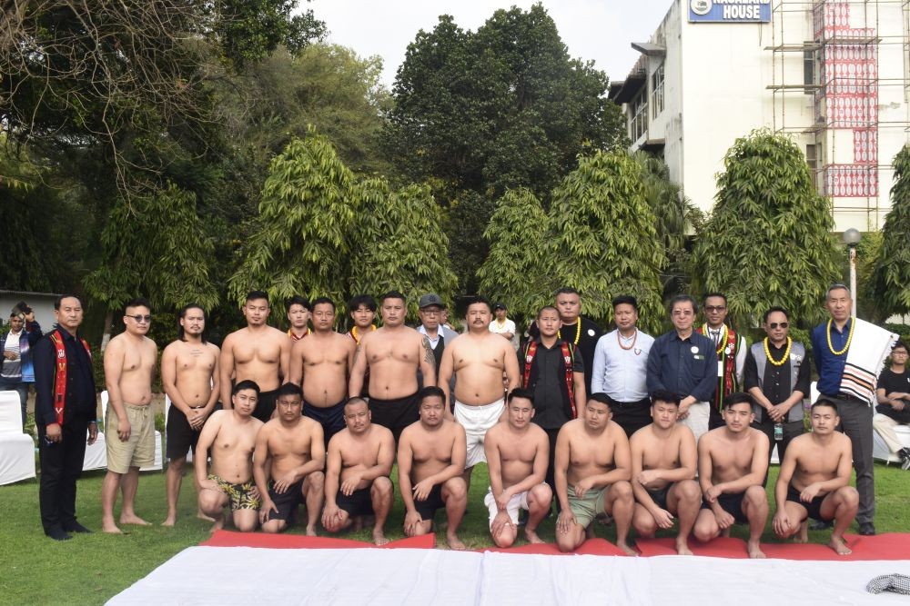 Participants in the Open Naga Wrestling competition and attendees at the Sekrenyi celebration at Nagaland House, New Delhi.